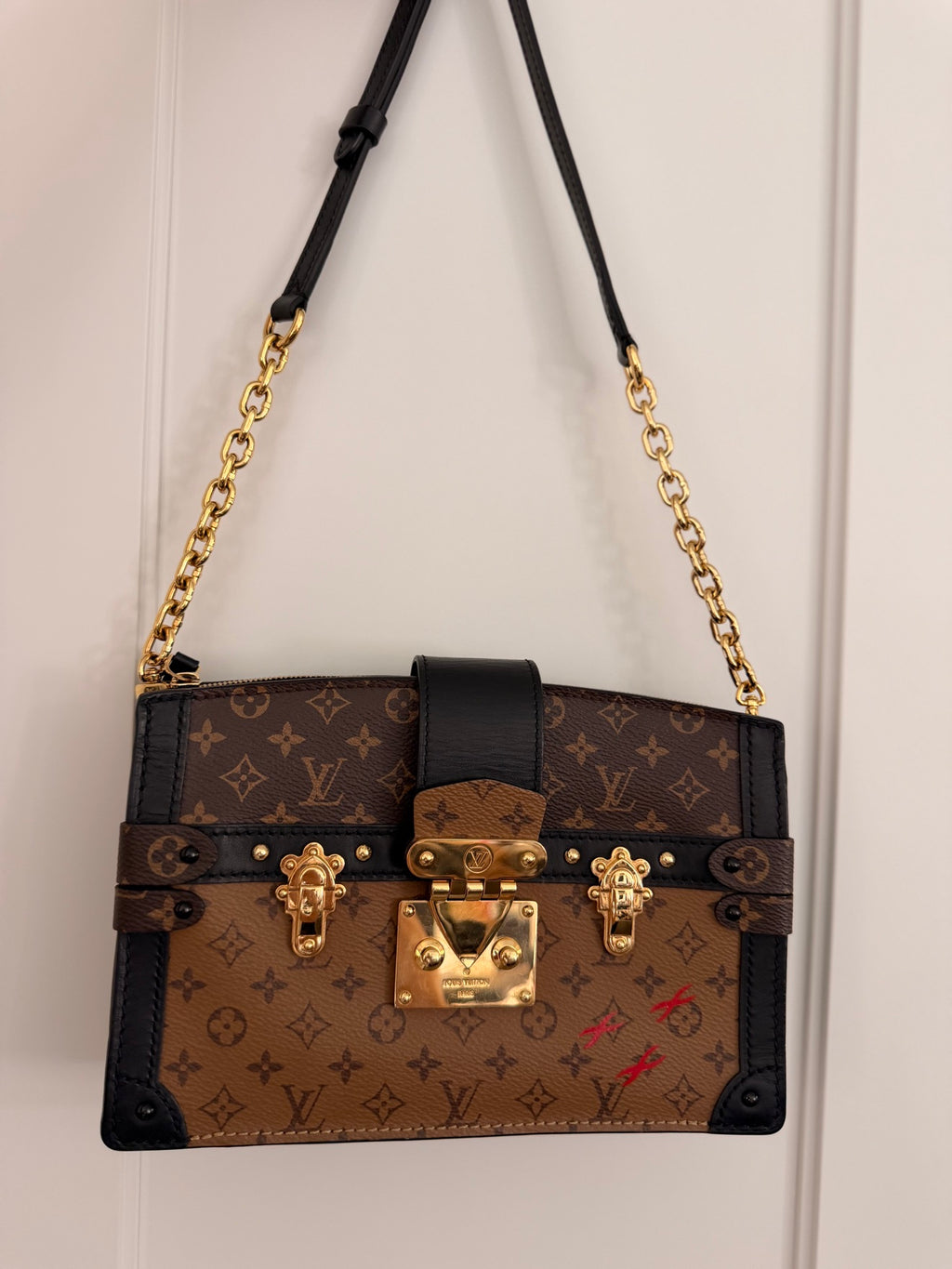 Louis Vuitton Monogram Reverse Trunk Clutch — Black Trim