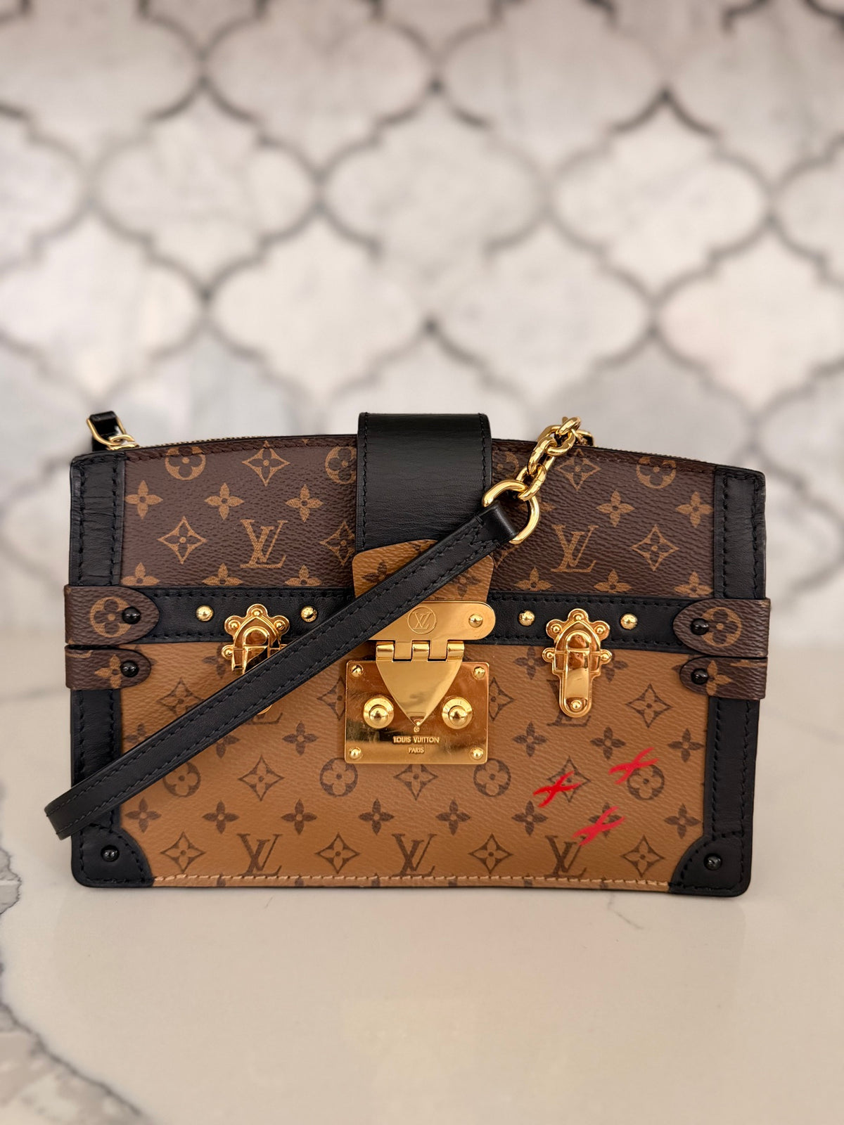 Louis Vuitton Monogram Reverse Trunk Clutch — Black Trim