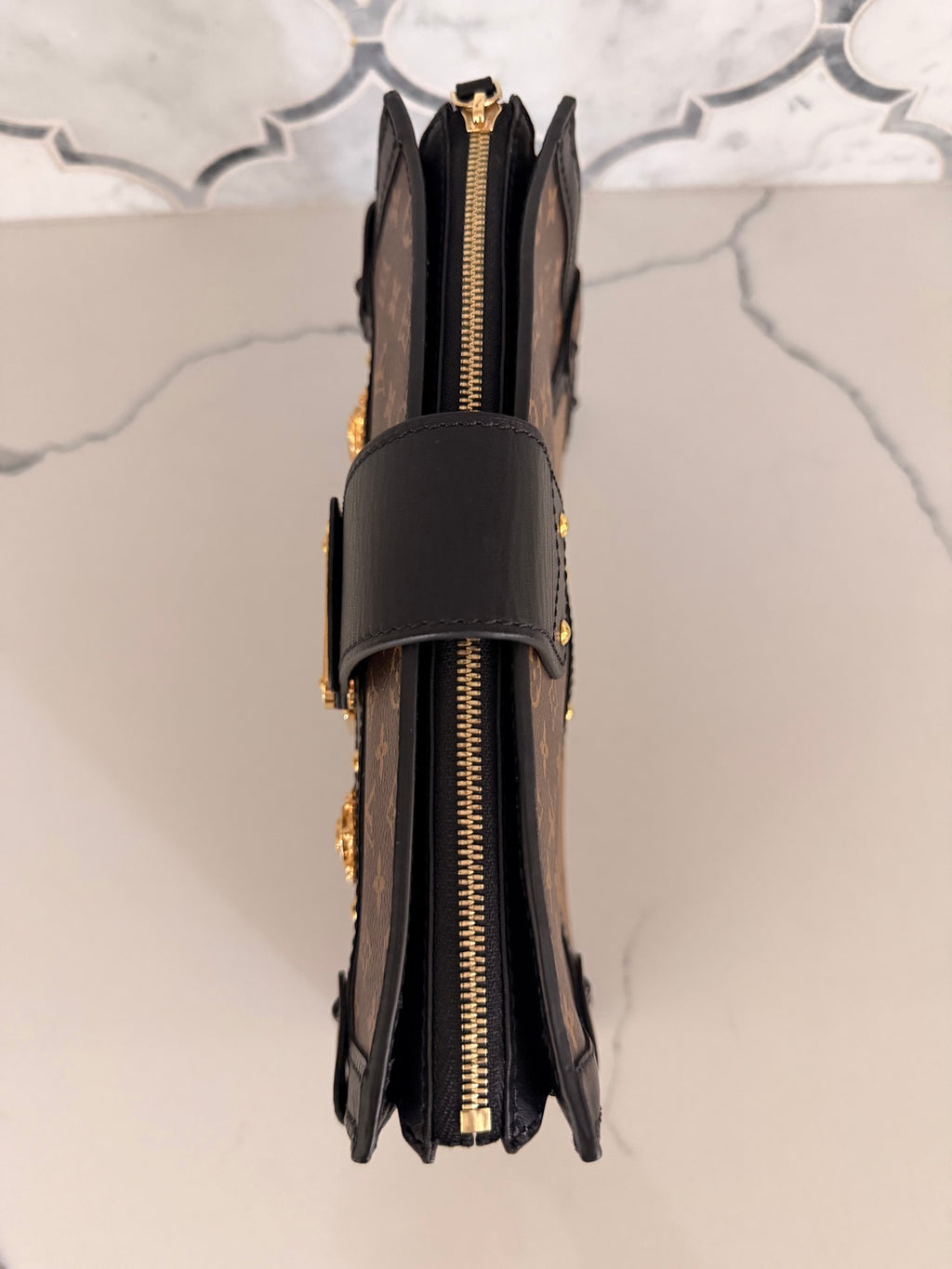 Louis Vuitton Monogram Reverse Trunk Clutch — Black Trim