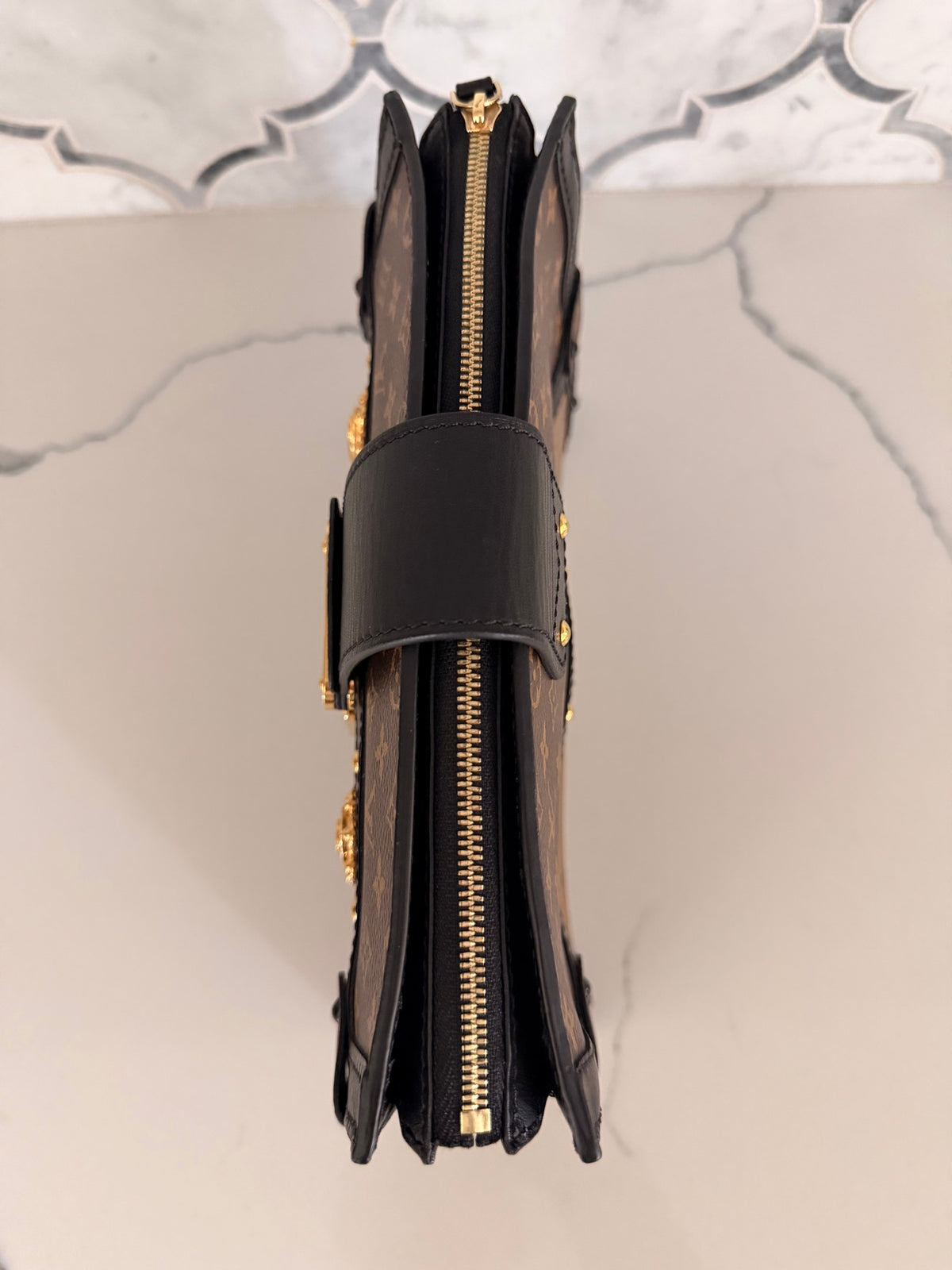 Louis Vuitton Monogram Reverse Trunk Clutch — Black Trim