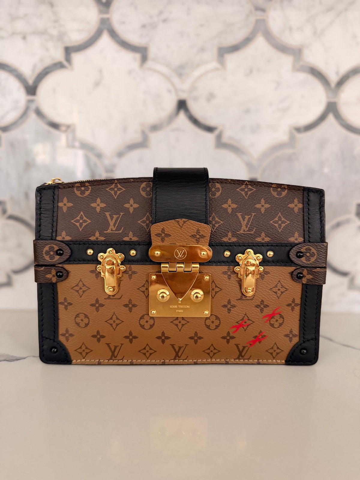 Louis Vuitton Monogram Reverse Trunk Clutch — Black Trim