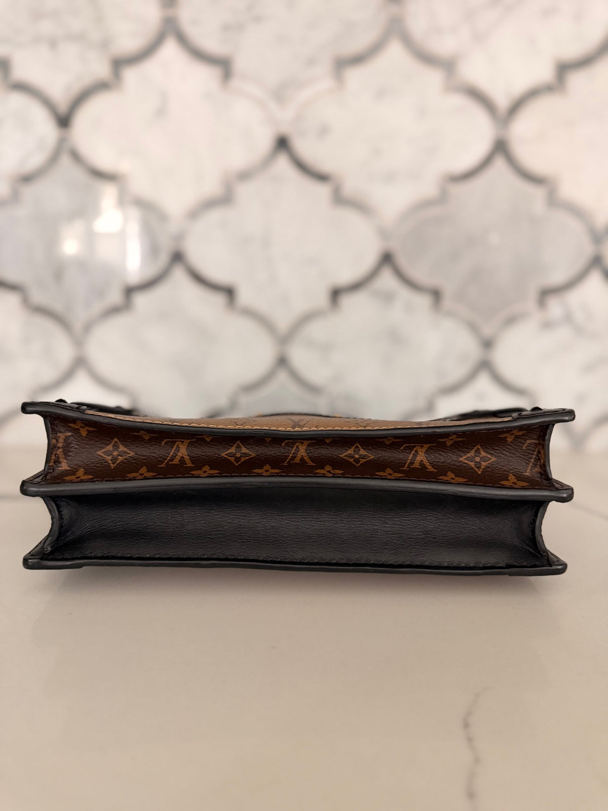 Louis Vuitton Monogram Reverse Trunk Clutch — Black Trim